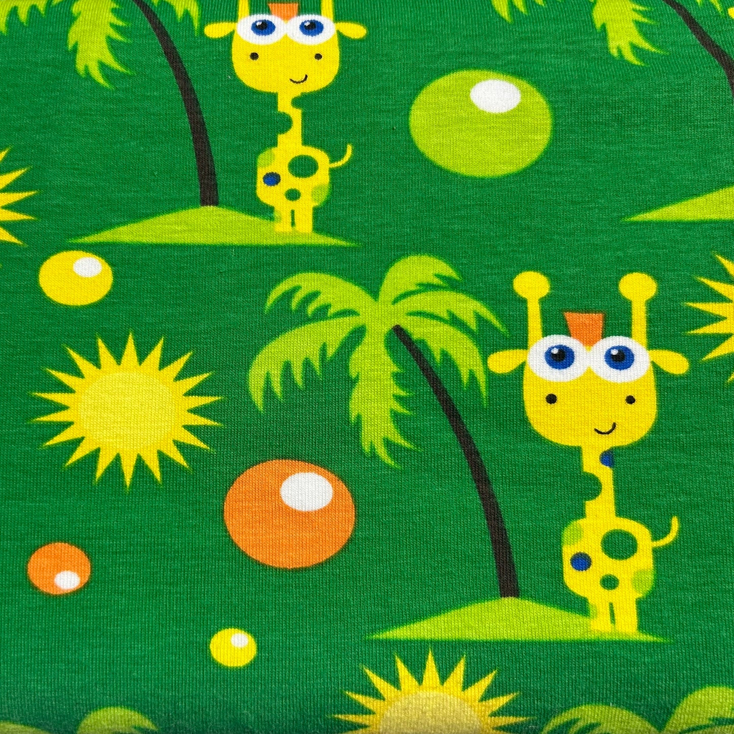 Giraffe Island Green Jersey Stoff