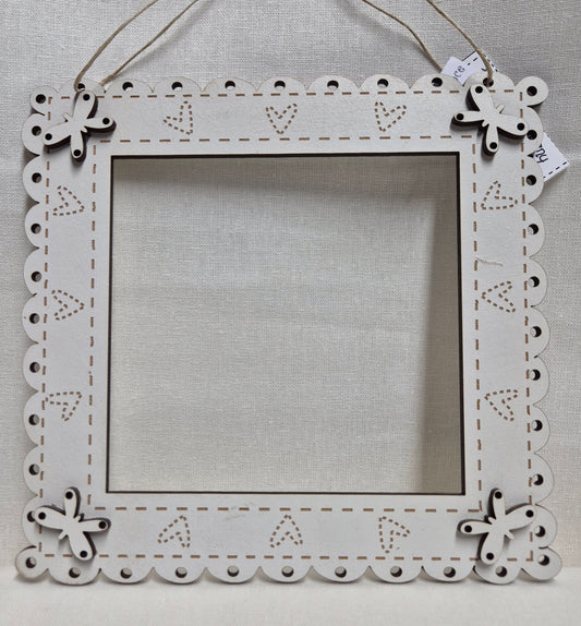 Quadratischer Rahmen mit Schmetterlingen